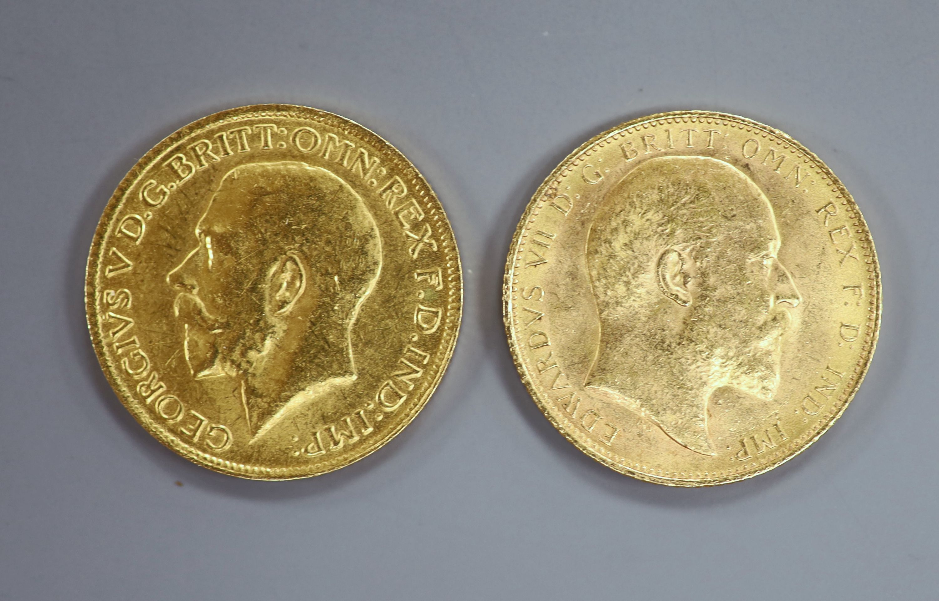 Two gold sovereigns, 1904 & 1911.